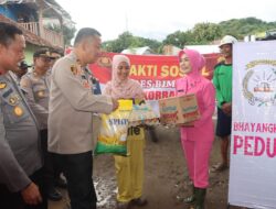 Peduli Korban Dampak Banjir, Polres Bima Kota Berbagi Ratusan Paket Sembako
