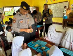 Polsek Madapangga Kawal dan Bantuan Pendistribusian Makan Gratis Bergizi di 44 Sekolah
