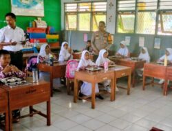 Bhabinkamtibmas Memonitor Pendistribusian Makan Bergizi Gratis (MBG) di Sekolah Dasar Kota Bima